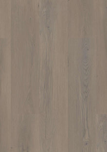 Mehrere Holzbretter mit sichtbarer Maserung, dezente Grau-Braun-Töne, natürliche Holzstruktur, feine Astlöcher.